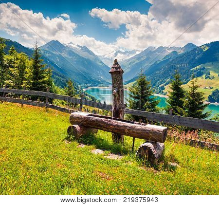 Colorful summer morning on the Speicher Durlassboden lake. View of Richterspitze mountain range in the Austrian Alps Schwaz district in the Tyrol state Austria Europe. Artistic style post processed photo.