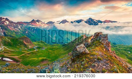 Great view from a bird's eye of Grossglockner High Alpine Road. Colorful summer sunset in Austrian Alps Zell am See district state of Salzburg Austria Europe. Artistic style post processed photo.