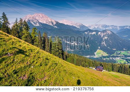 View from cableway cabine above the Konigsee lake on Schneibstein mountain ridge. Colorful summer morning on a border of Germany and Austrian Alps. Berchtesgaden location Bavaria Germany Europe.