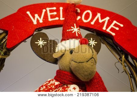 Christmas Decorations With Reindeer With Red Scarf And Wooden Frame