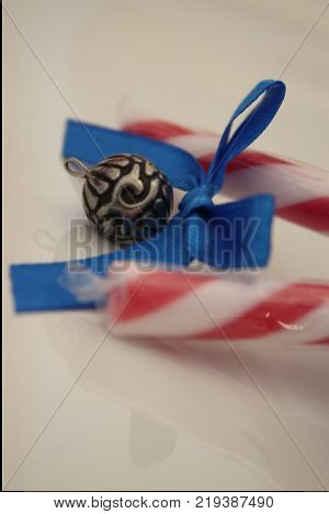 Christmas decorations with adornment sugar sticks with blue ribbon