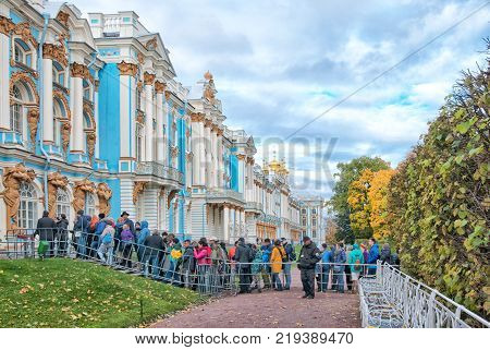 TSARSKOYE SELO, SAINT-PETERSBURG, RUSSIA - OCTOBER 7, 2017: Many people lined up to enter The Catherine Palace in The State Museum Preseve Tsarskoye Selo