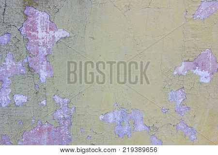 Old threadbare weathered concrete wall texture colored by different colors.