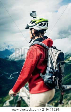 Female Mountain biker with Actioncam mounted on Helmet.