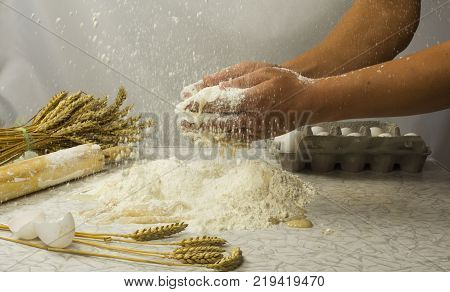 dough with close-up. man is preparing bread dough