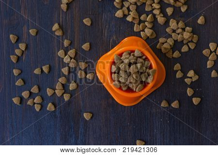 Top view of dry pet food in a bowl