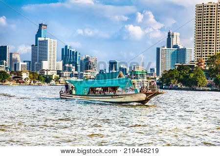 BANGKOK, THAILAND-JAN 20,2016: Business district cityscape from Jaopraya river in Bangkok on Jan 20, 2016, Tailand.