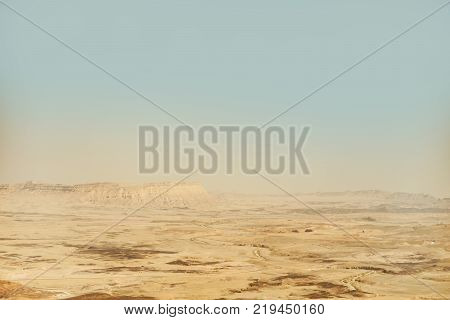 Mitzpe ramon crater in israel. Landscape view on negev desert and mountains. Middle east hot volcanic hills
