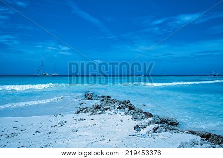 Travel photography - tropical beach with white sand and a blue sky (Saona island, Dominican Republic).