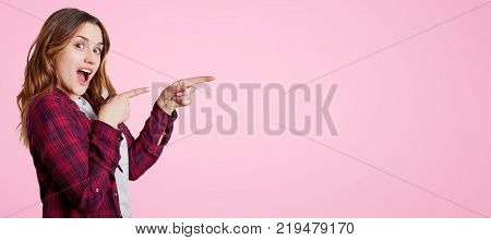 Headshot Of Unhappy Sorrorful Female Curves Lips, Looks Desperately At Camera, Being Upset To Hear B