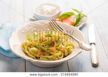tagliatelle witn pesto cream sauce and smoked salmon