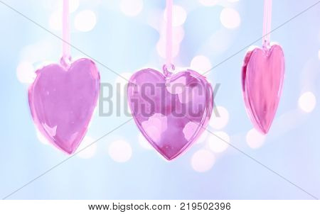 Two red hearts of ribbon. Valentines day greeting card.