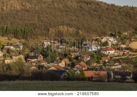 View for Dobetice village and part of town Usti nad Labem in winter sunny day