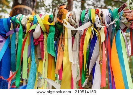 Colored Ribbons To The Holy Tree. Zalaal. Near Source Of Mineral Water. Arshan. Russia