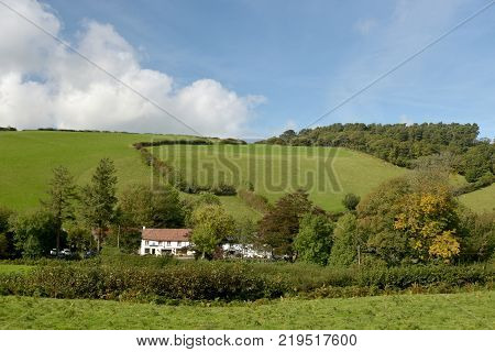 Farmland landscape of fields and hedges near Malmsmead in Doone Valley, Exmoor, North Devon