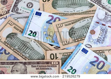 various currencies on the table banknotes from different countries overlapping each other