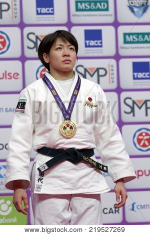ST. PETERSBURG, RUSSIA - DECEMBER 16, 2017: Miku Tashiro, Japan during award ceremony of Judo World Masters 2017. Tashiro won gold medal in Women U63