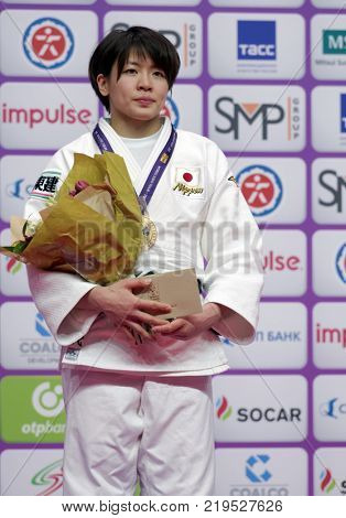 ST. PETERSBURG, RUSSIA - DECEMBER 16, 2017: Miku Tashiro, Japan during award ceremony of Judo World Masters 2017. Tashiro won gold medal in Women U63