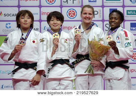 ST. PETERSBURG, RUSSIA - DECEMBER 16, 2017: Winners in Women U63 during award ceremony of Judo World Masters 2017. Left to right: Nabekura, Tashiro, Franssen, Agbegnenou
