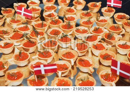 Delicious sandwiches with red caviar. Fresh bread for Breakfast.