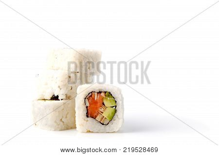 sushi isolated on white background Traditional japanese futomaki roll stuffed with tobiko caviar tomago omelet cucumber