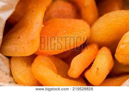 Close-up of tasty dried orange apricots. Selective focus