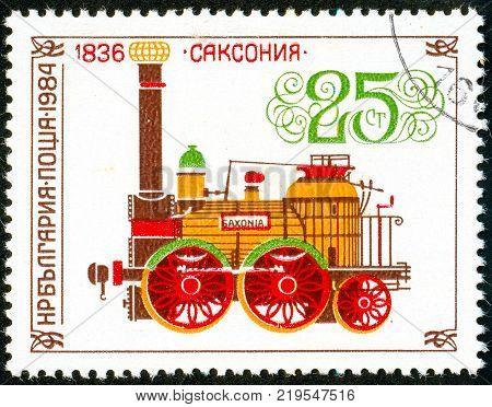 Ukraine - circa 2017: A postage stamp printed in Bulgaria shows drawing Locomotive Saxonia 1836. Series: Old steam locomotives. Circa 1984.