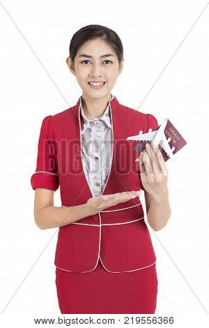 Portrait Of Asian Air Hostess Holding Airplane Model With White Background, Woman Stand And Smile At
