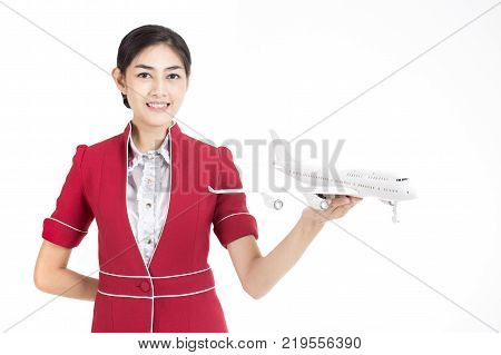Portrait Of Asian Air Hostess Holding Airplane Model And Passport With White Background Woman Stand 