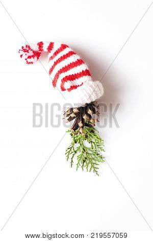 Gnome or elf face from natural materials. Christmas silhouette picture in minimalistic design concept