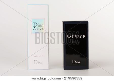 Brnenec, Czech Republic-December 5,2017: Two boxes of the fragrance for women Dior Addict and for men Dior Savuage on white background.