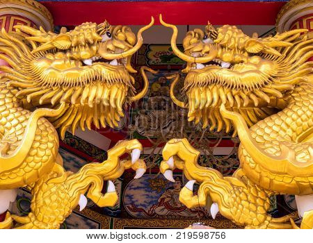 Gold Dragon Statues In Chinese Religious Venues