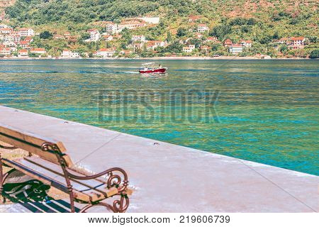 A pleasure boat near the village of Donji Stoliv near the town of Perast, the Bay of Kotor, the Adriatic Sea, Montenegro.