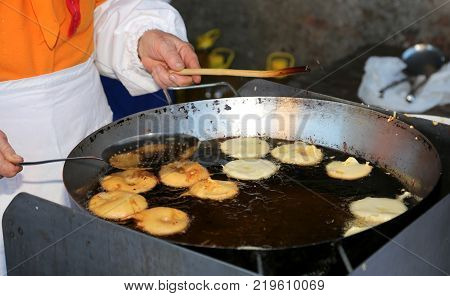 Chef Put Salt On Meat Called Arrosticini In Italian Language A Traditional Italian Cuisine Of Abruzz