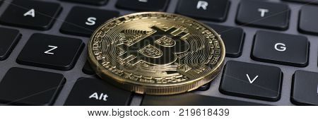 bitcoin on laptop keyboard exchage crypto currency mining