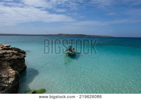Travel photography - fishing boat anchored next to Cubagua island (Venezuela).