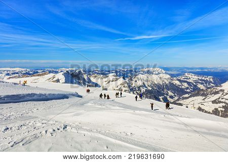 Mt. Titlis, Switzerland - 9 March, 2016: view from the top of the mountain. The Titlis is a mountain, located on the border between  the Swiss cantons of Obwalden and Bern.
