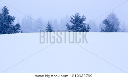 Snowy And Foggy Mountain Winter Landscape