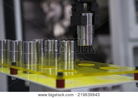 Robotic arm pick and place automation;process of picking part up and placing it in CNC machine