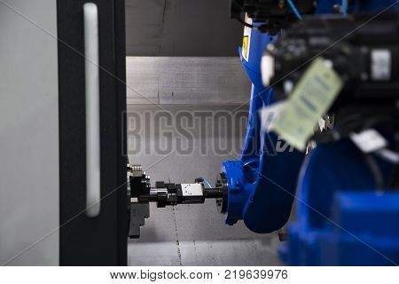Robotic arm pick and place automation;process of picking part up and placing it in CNC machine