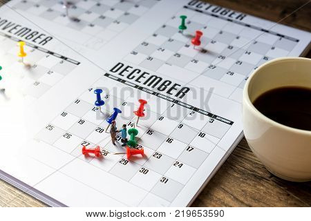 miniature employees handshaking. Image of business contract. appointment and meeting reminder
