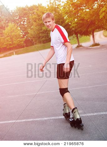 Young active roller blade skater