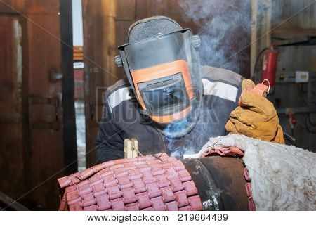 Welder In The Shop Weld Sample From The Tube With Concomitant Heating For Attestation