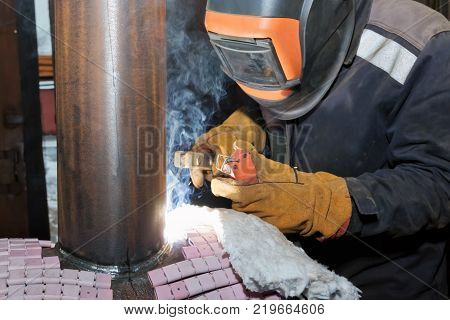 Welder In The Shop Weld Sample From The Tube With Concomitant Heating For Attestation