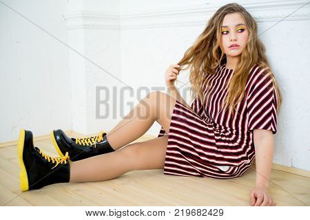A portrait of a girl model in a stdio