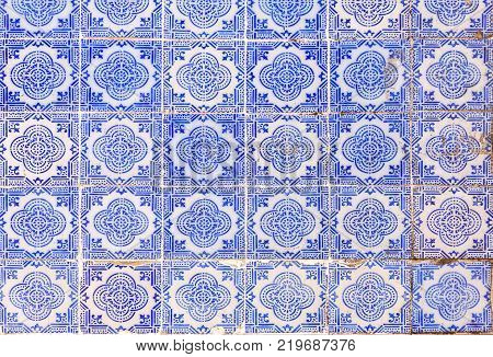 Typical Portuguese and Spanish old painted tin-glazed ceramic tilework (Azulejo)