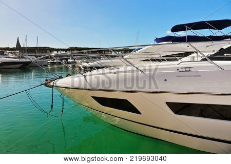 Luxury boats anchoring at the yacht marina of Port d'Andratx, Mallorca island, Spain Mediterranean Sea, Balearic Islands.