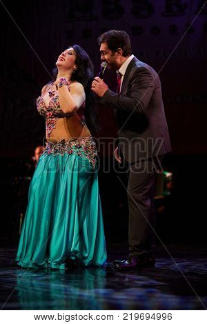 MOSCOW, RUSSIA - OCT 21, 2017: Nour and Yasser Alama organizers of 12th international festival of oriental dance ASSEMBLY 2017 on stage of Luna Theatre during Gala Concert.