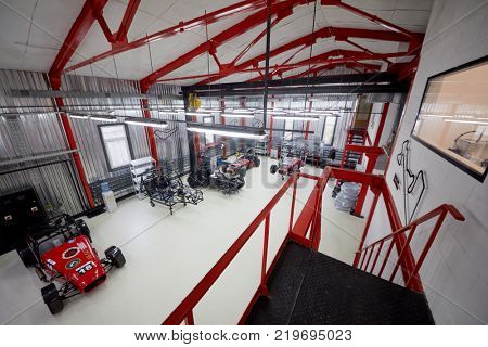 MOSCOW, RUSSIA - OCT 27, 2017: (PR) Garage of DB 527 company producer of russian sports cars with racing cars based on Lotus Seven.