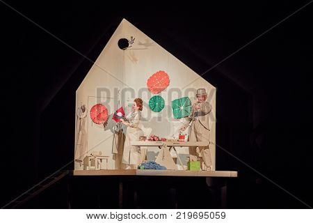 MOSCOW, RUSSIA - OCT 22, 2017: Actors play on stage of New Opera Theatre during fairytale performance Gingerbread House or Hansel and Gretel.